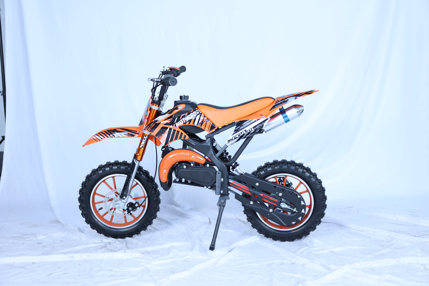 49cc Kids Pit Bike - Twist and Go, No Gears - Orange Child's Off-Road Dirt Bike - Ages 6-14 - Max Speed 35 km/h - High Strength Steel Frame - Wear-Resistant Tyres